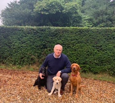 Iain with his dogs, (L) Jobi, (M) Bowie (R) Hettie All three dogs are medical dectection dogs, Jobi working on Prostrate Cancer, Hetti working on Cancer and puppy Bowie in training.